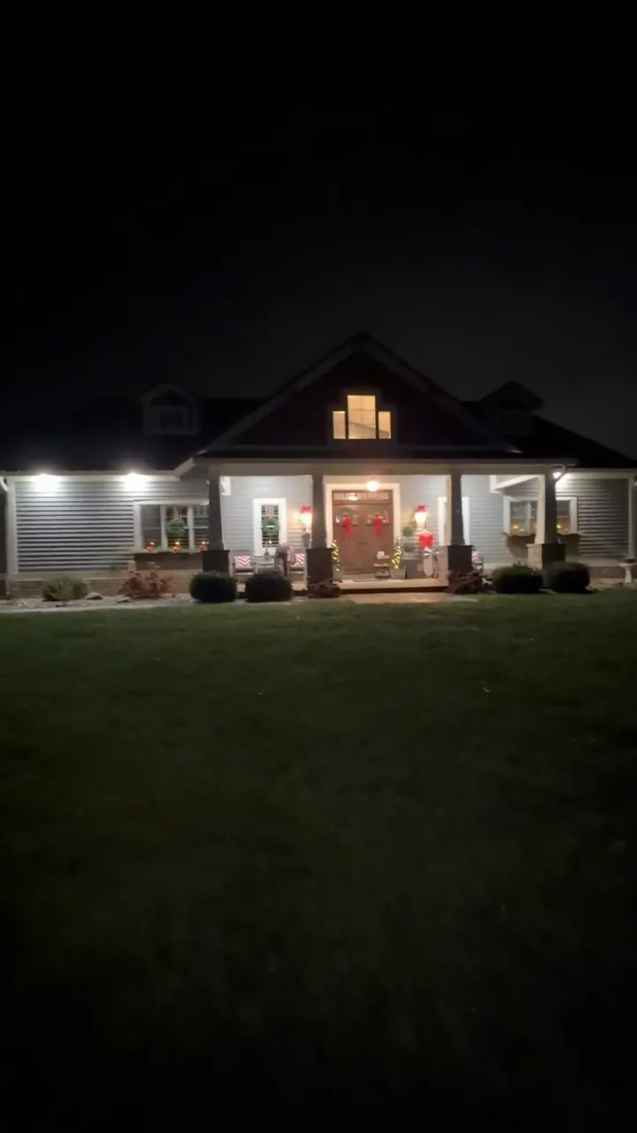 A house at night before its Christmas lights are switched on